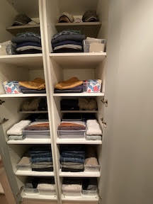 closet shelving will help to reorganize a closet which is a comment suggestion from professional organizers.
